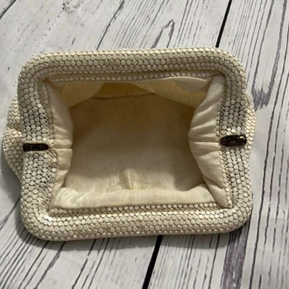 Dainty special occasion clutch with snap hinge closure cream